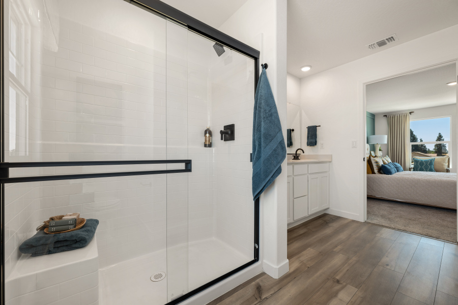 A bathroom with a glass shower.