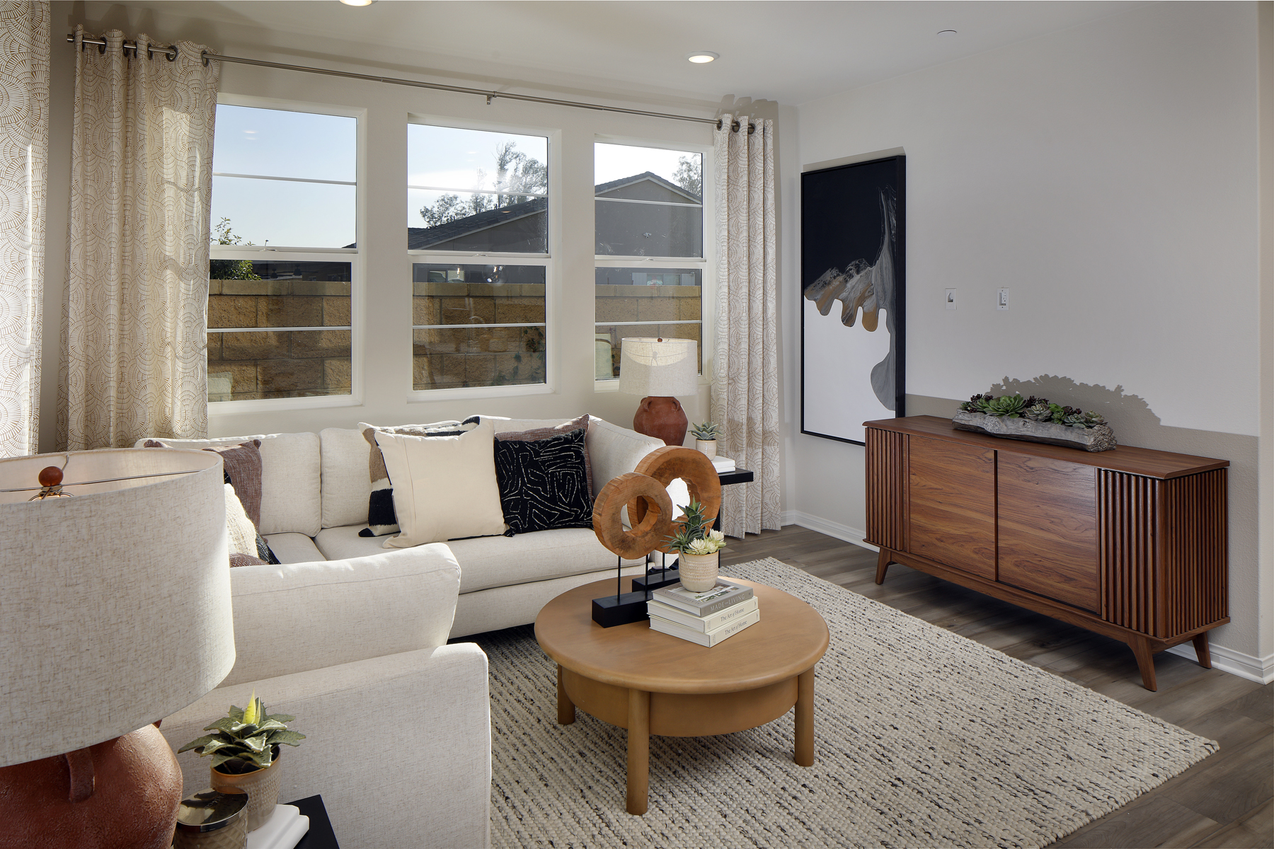 A living room with a large window.