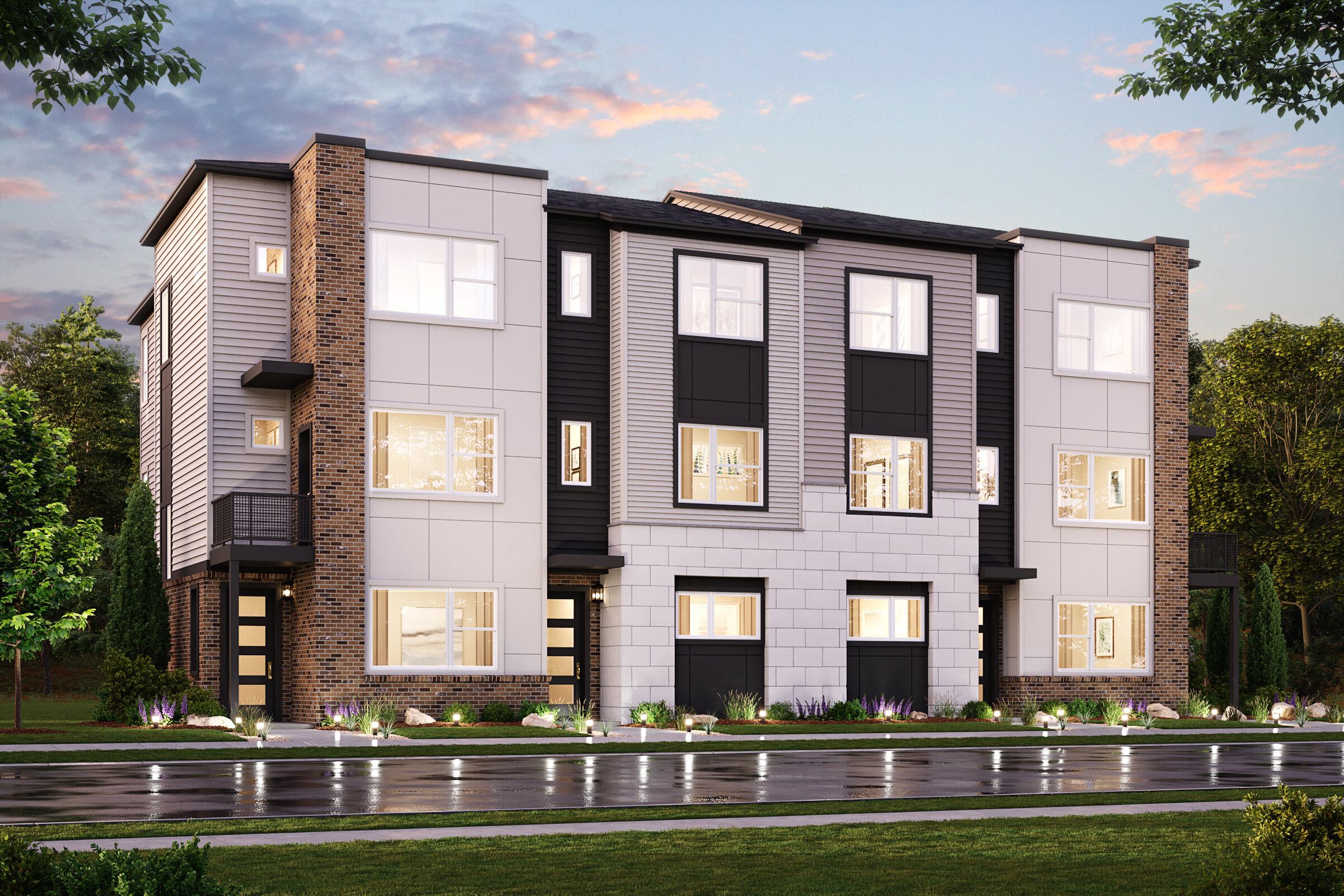 A building with a pool in front.