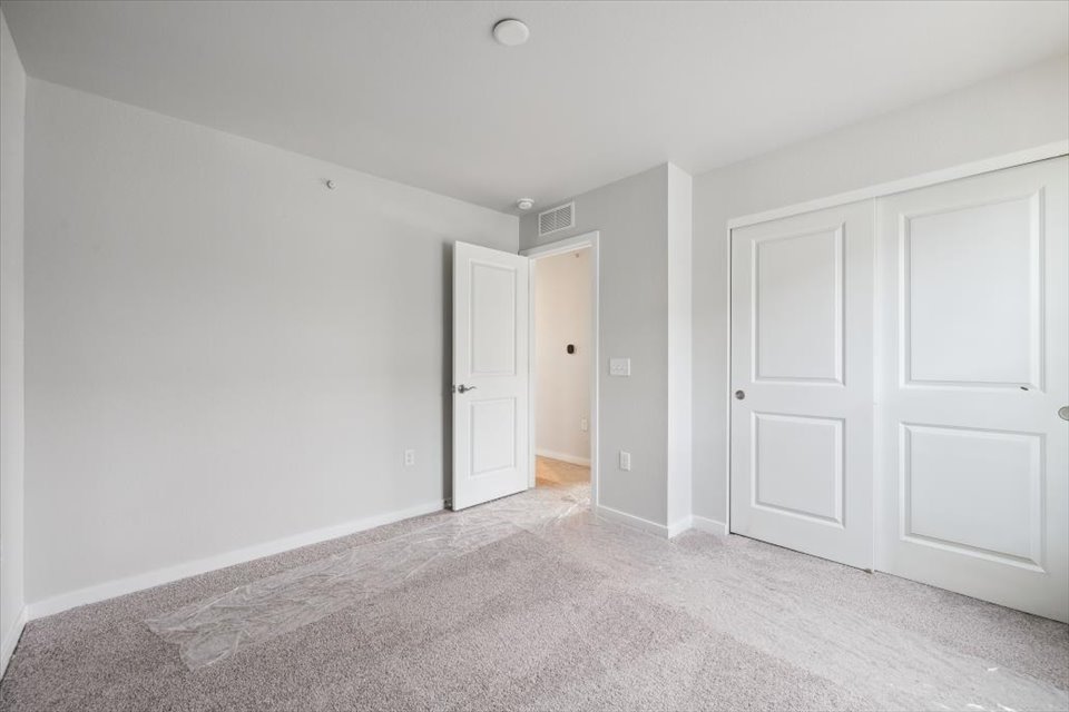 A room with white doors.