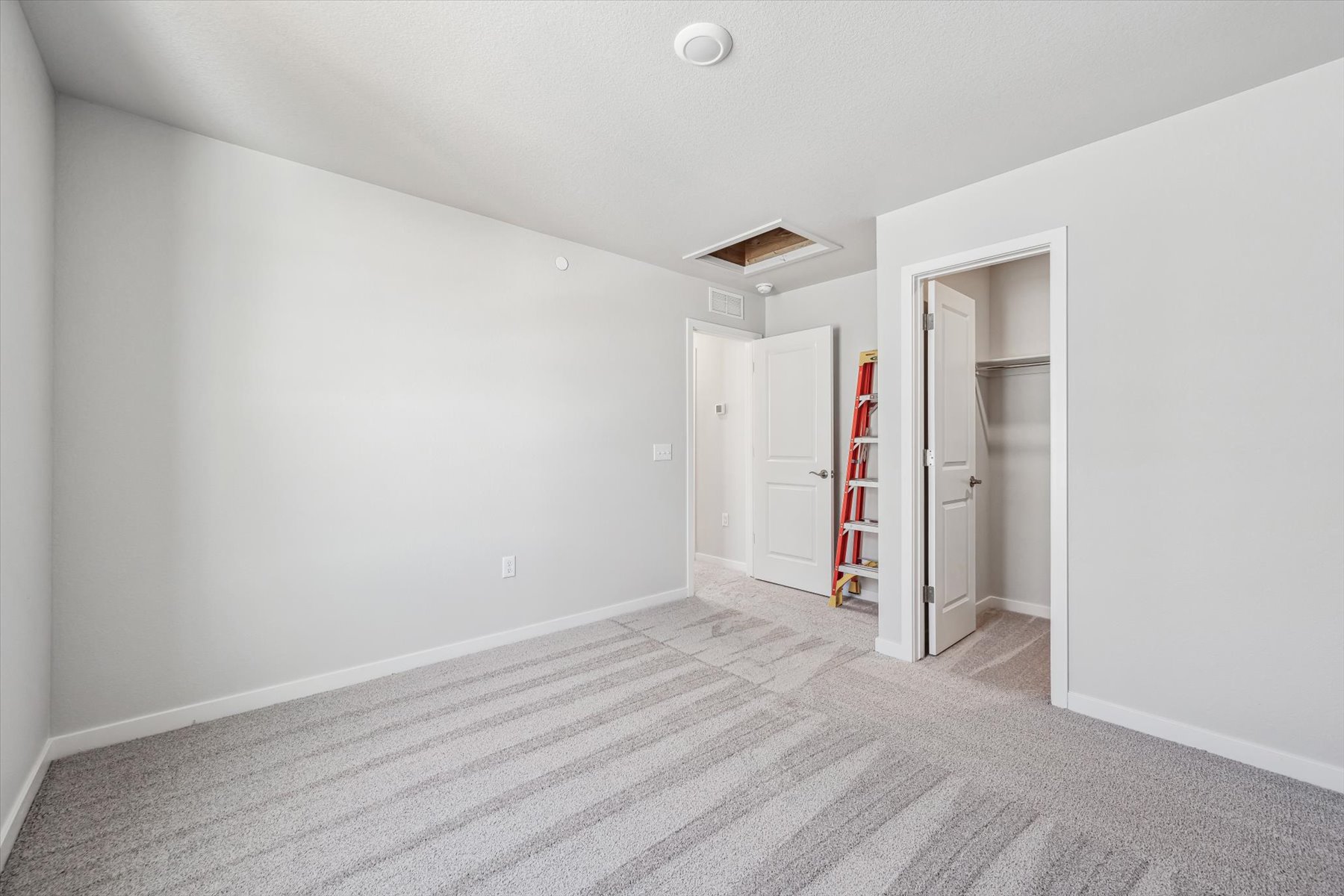 A room with white walls.