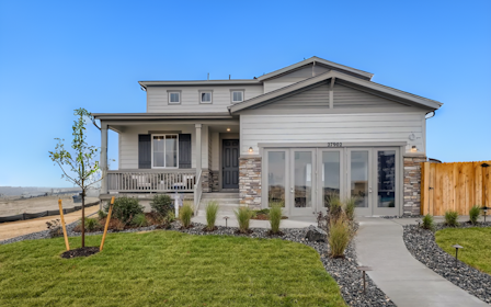 A house with a fence and yard.