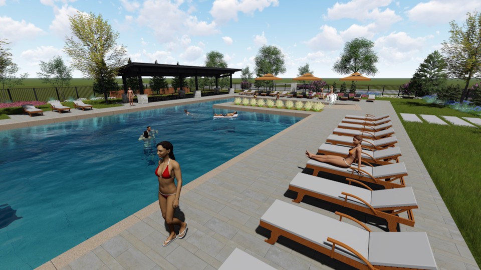 A person standing next to a pool.