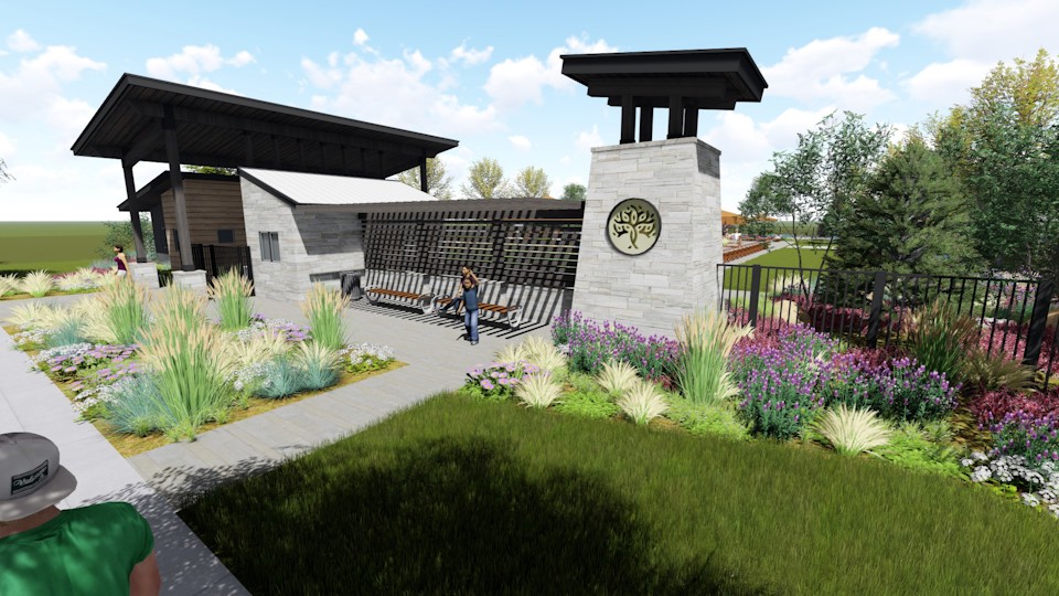 A person standing in a garden.