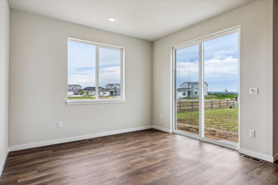 A room with a large window.