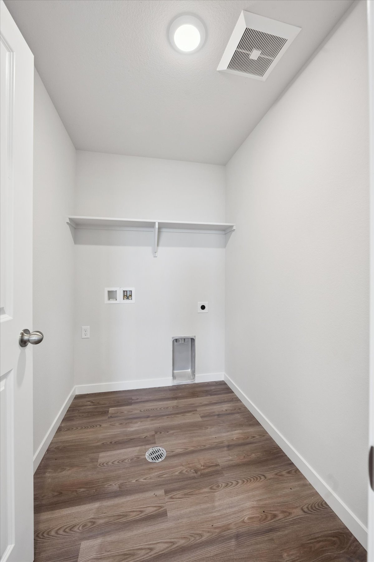 A room with a wood floor and a wood floor.