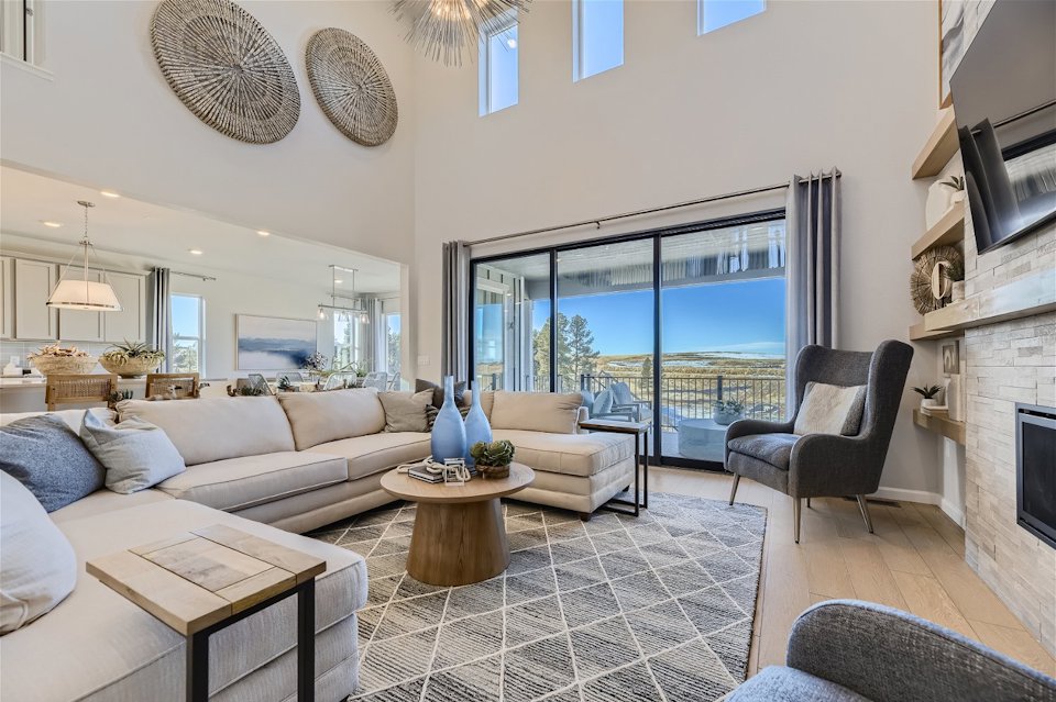 A living room with a large window.