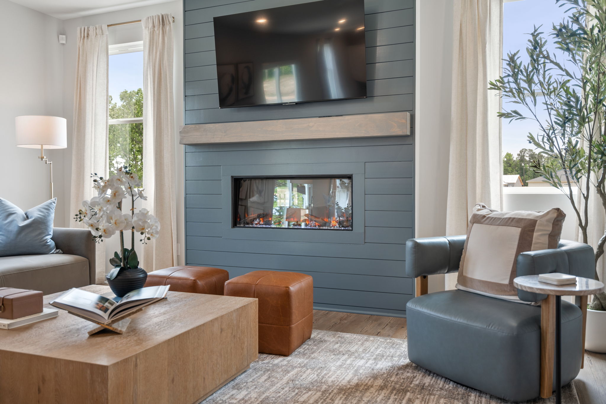 A living room with a fireplace.