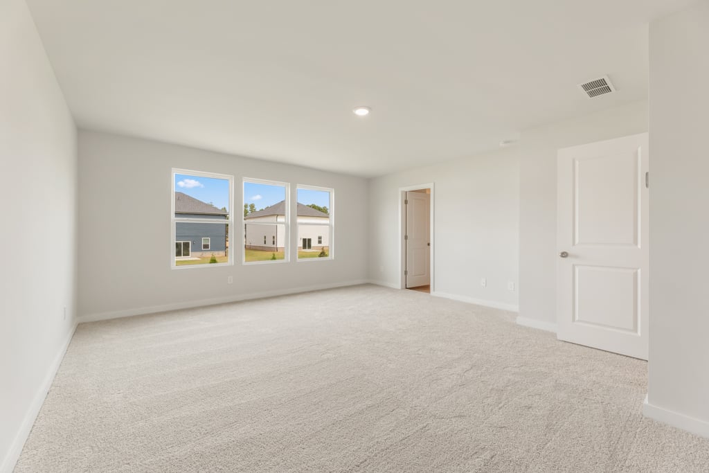 A room with white doors and windows.