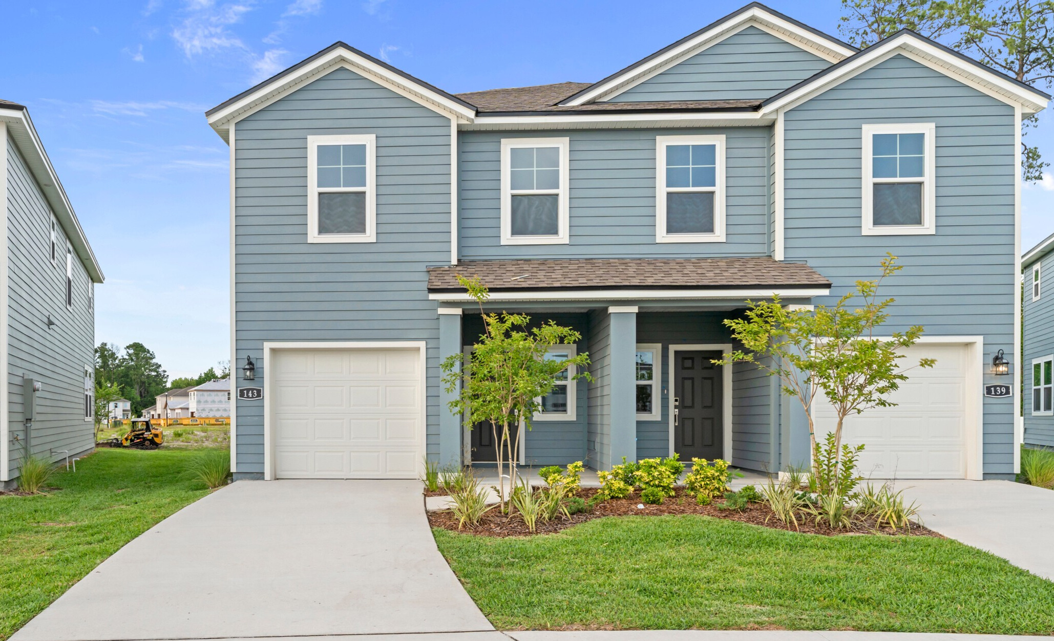 A house with a driveway.