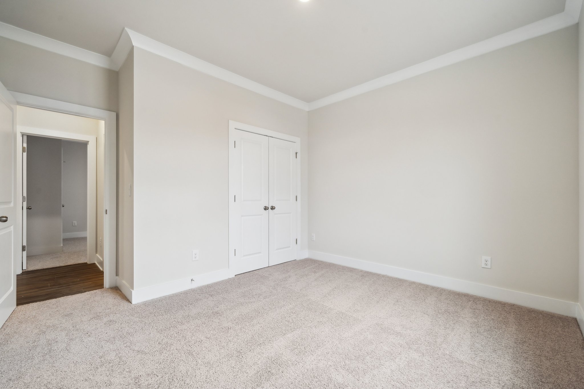 A room with white doors.