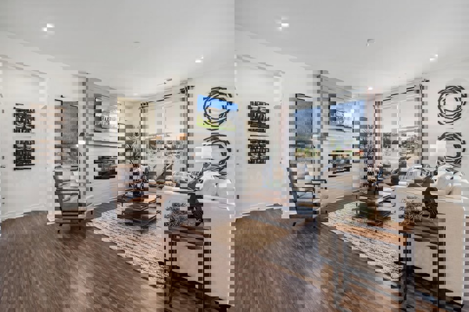 A living room with a fireplace.