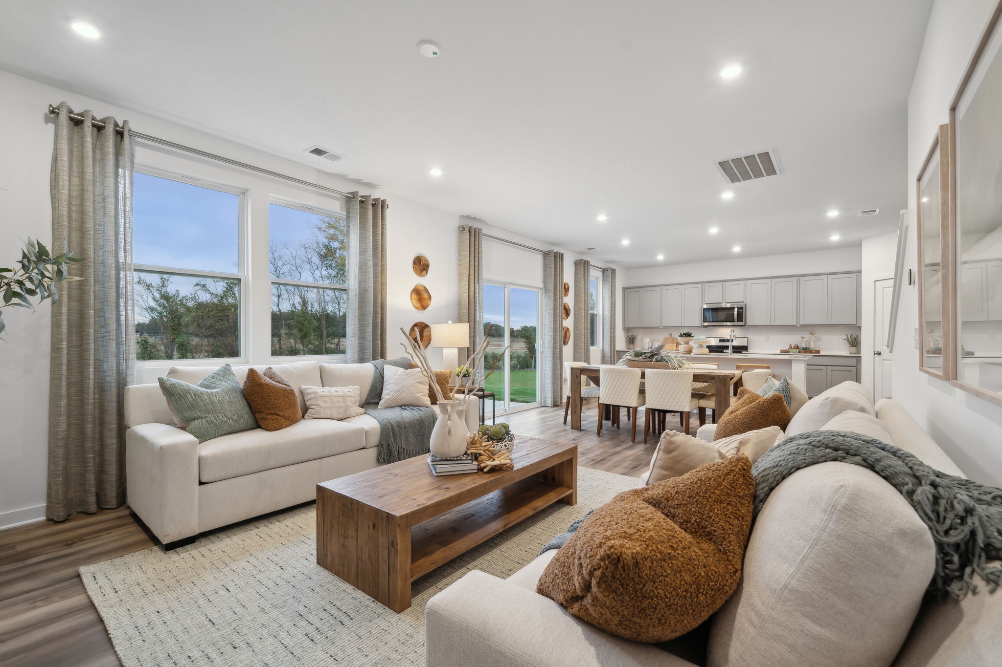 A living room with a large window.