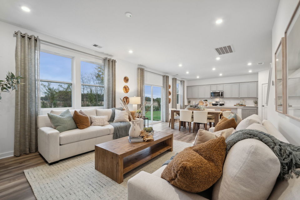 A living room with a large window.