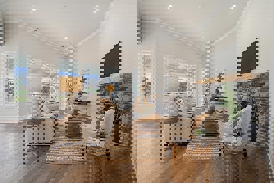 A living room with a fireplace.