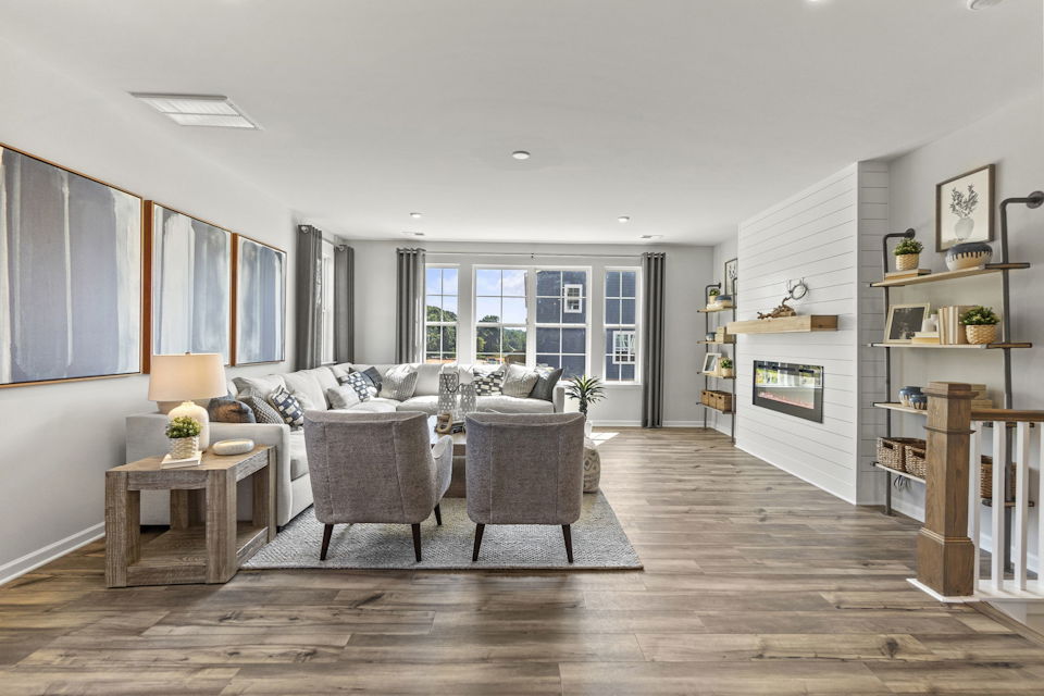A living room with a fireplace.