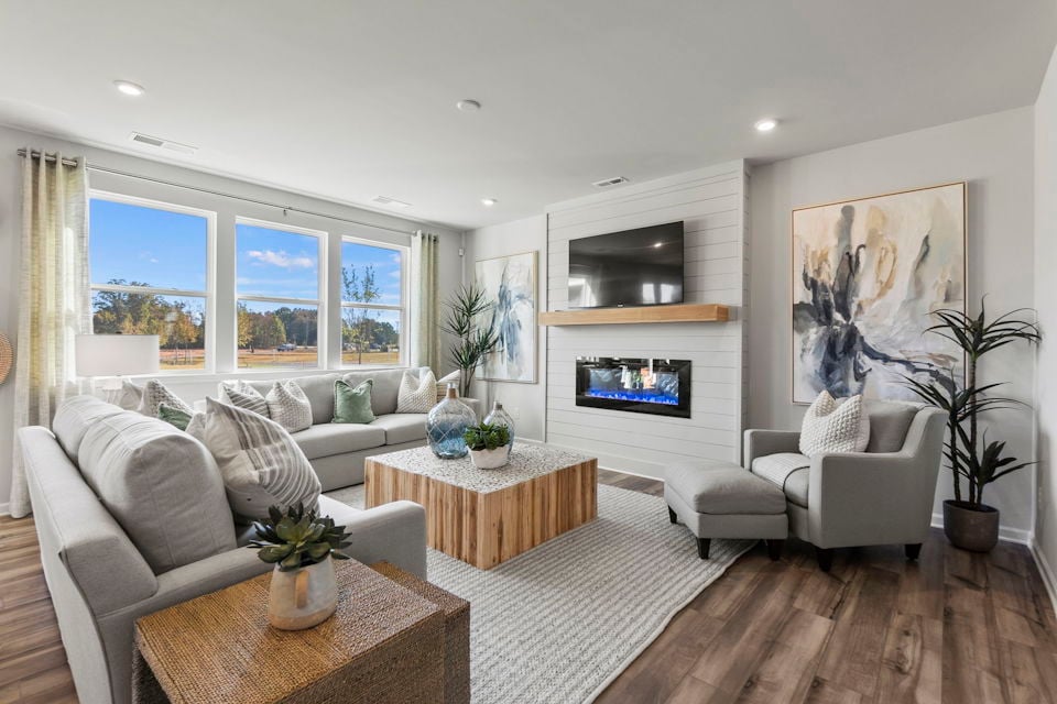 A living room with a fireplace.