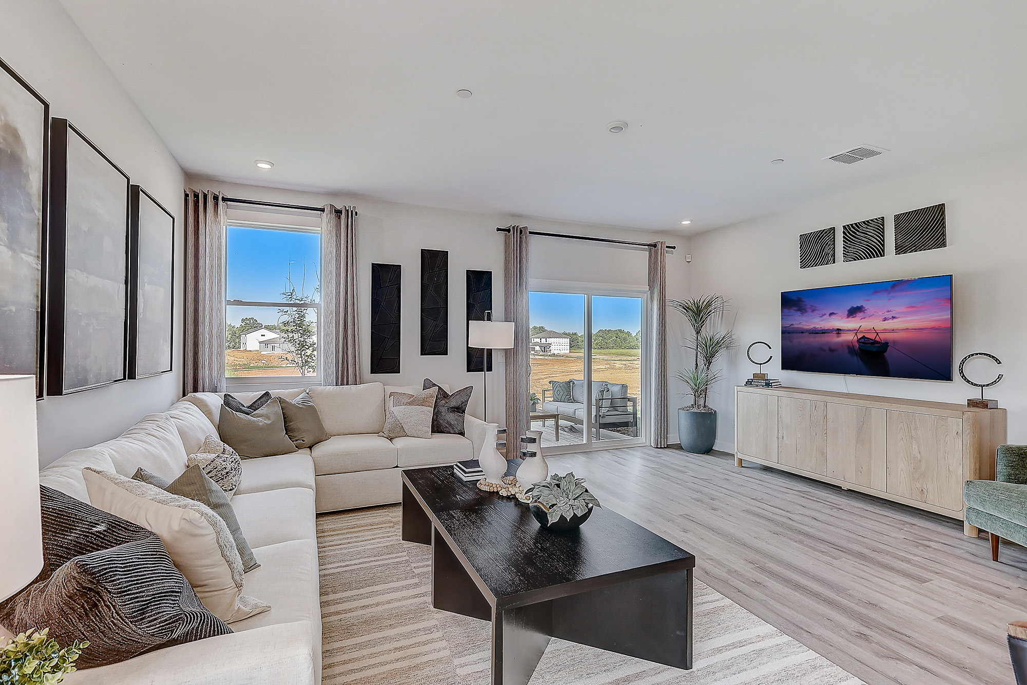 A living room with a tv and couches.