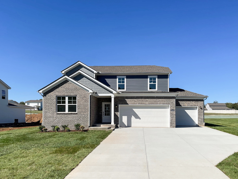 A house with a driveway.
