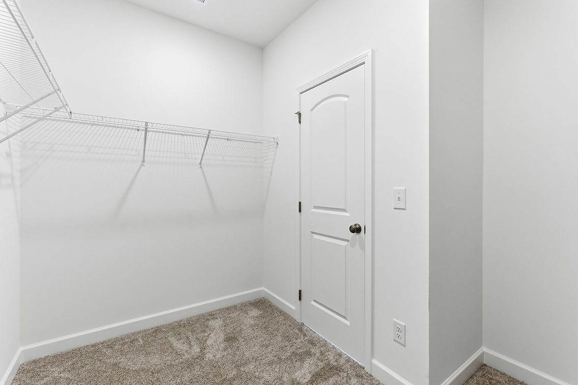 A white door in a room.