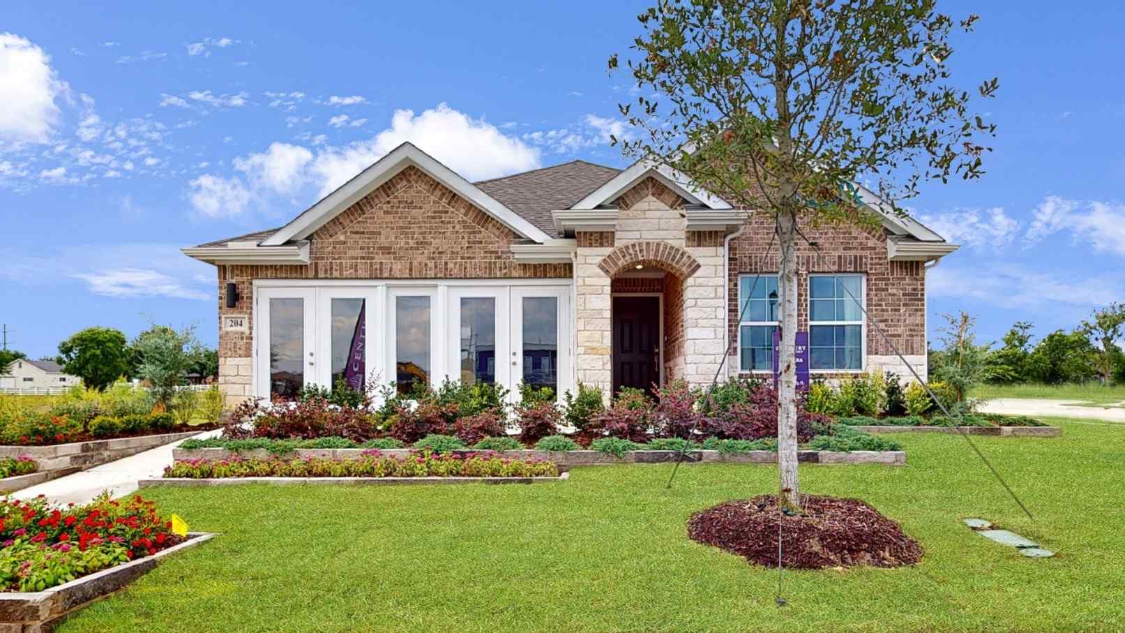 A house with a large front yard.