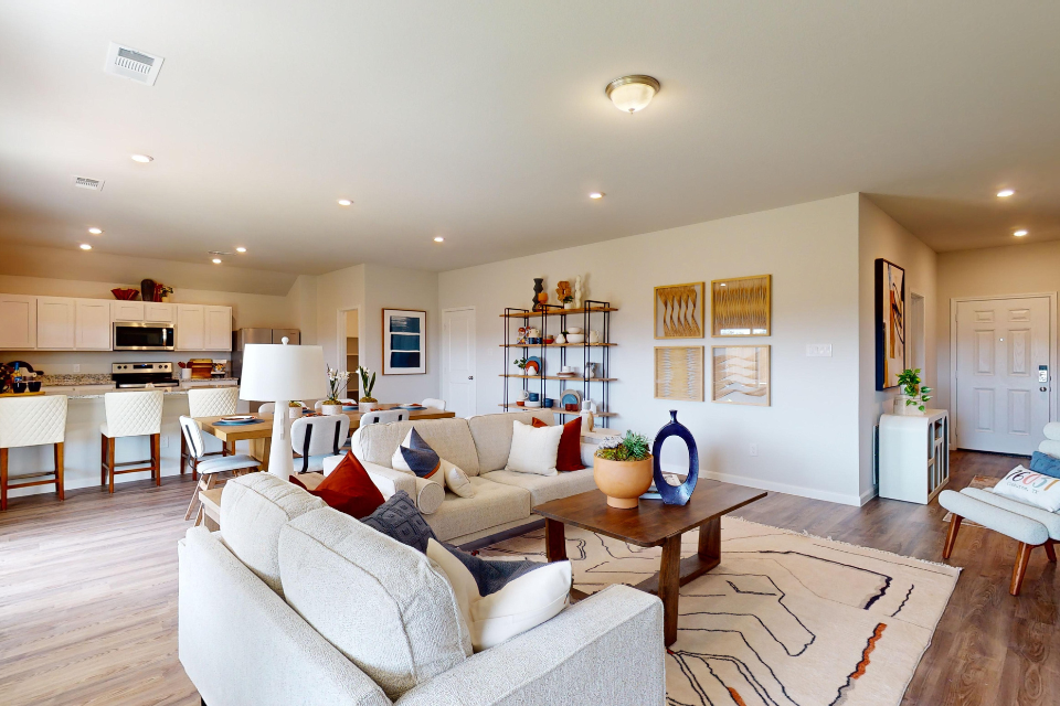 A living room with a couch and a coffee table.