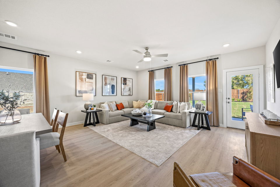 A living room with a large window.