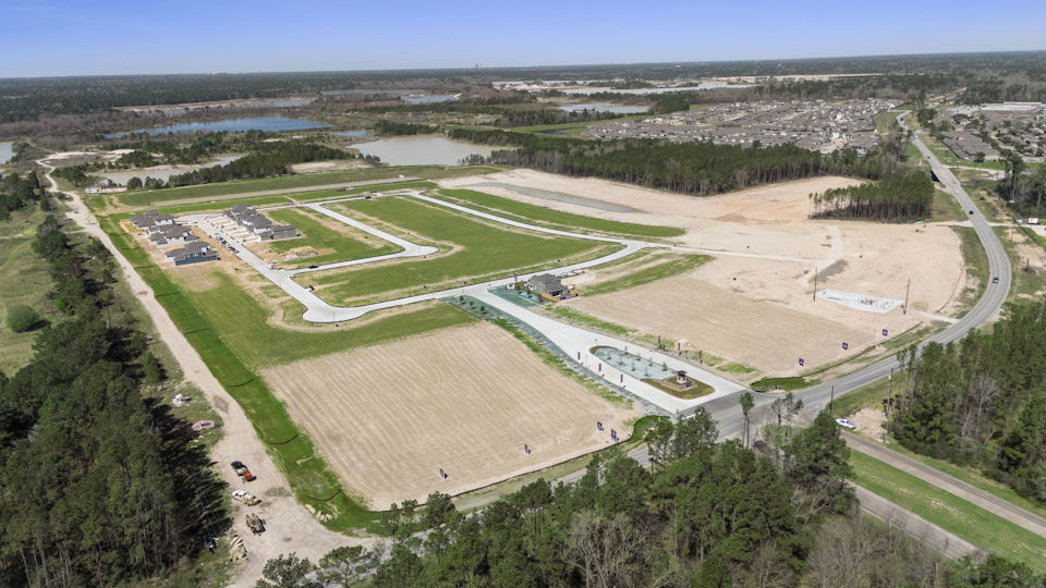 A large area with a road and trees around it.