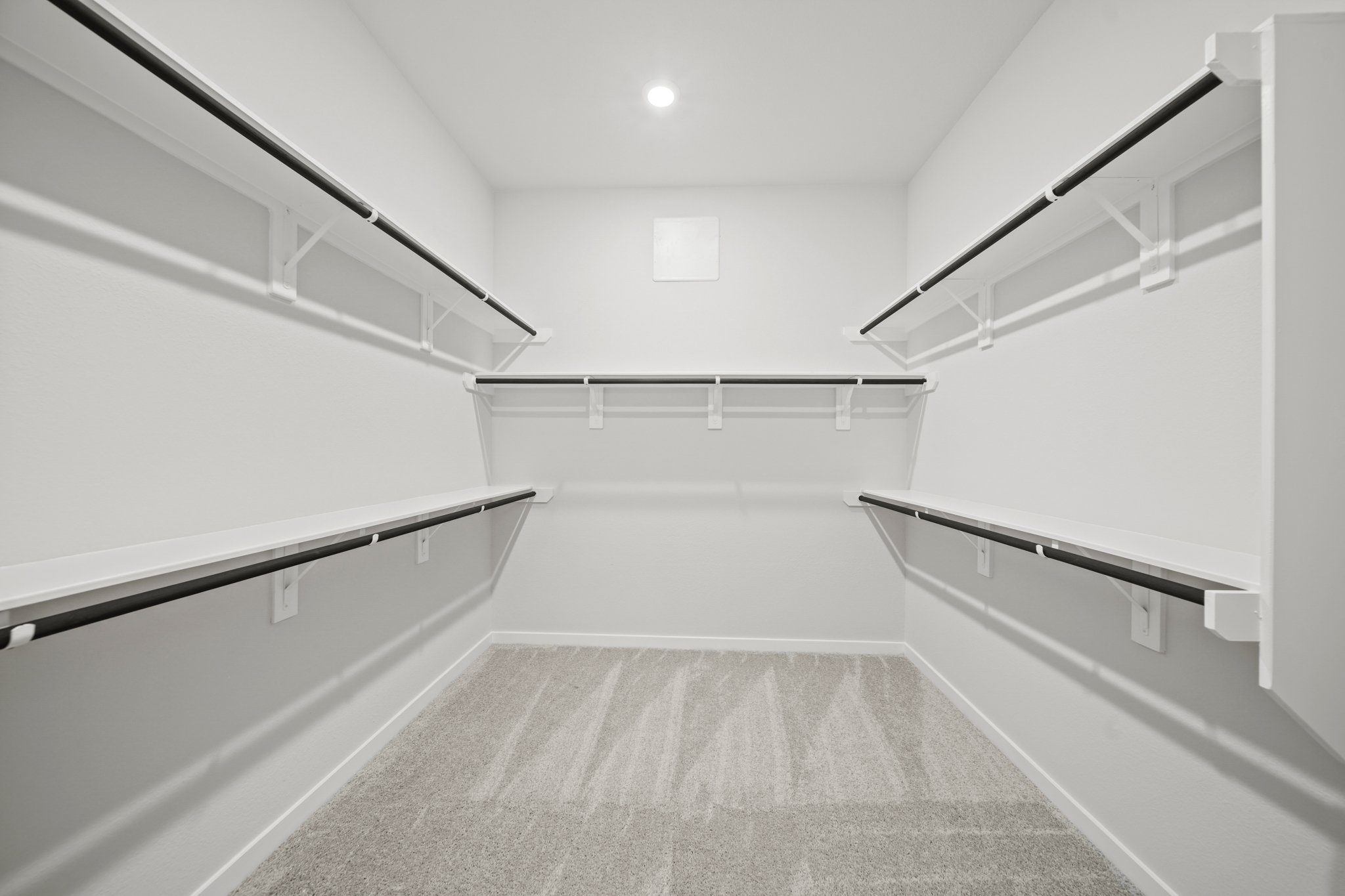 A white staircase in a building.