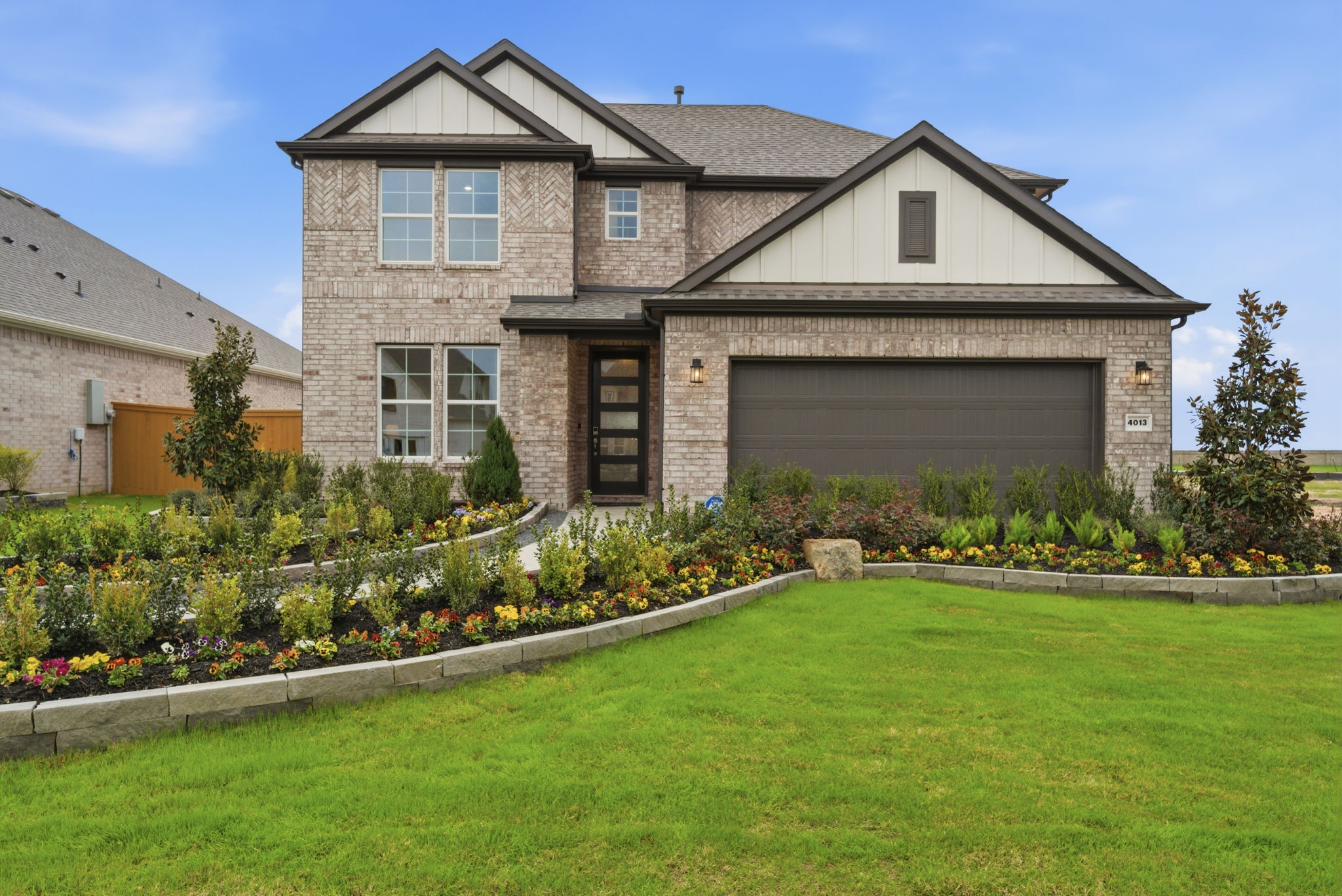 A house with a large front yard.