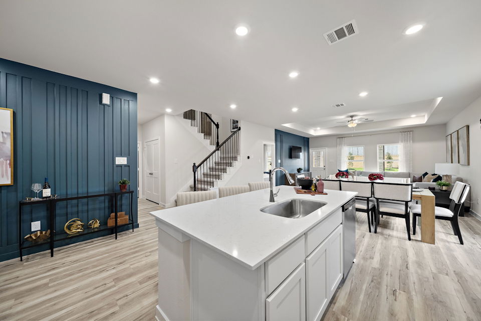 A kitchen with a large island.
