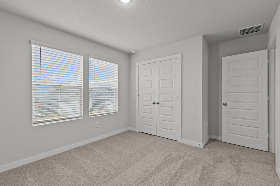 A room with white doors.