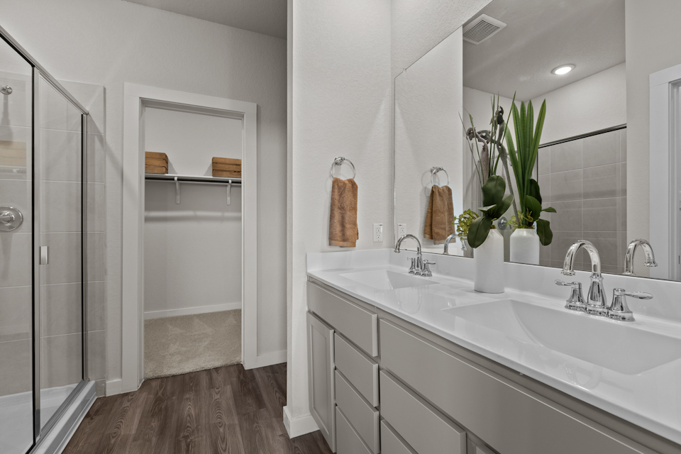 A bathroom with a glass shower.