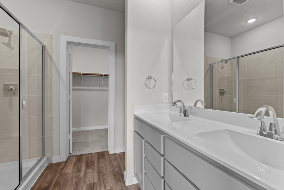 A bathroom with a glass shower.