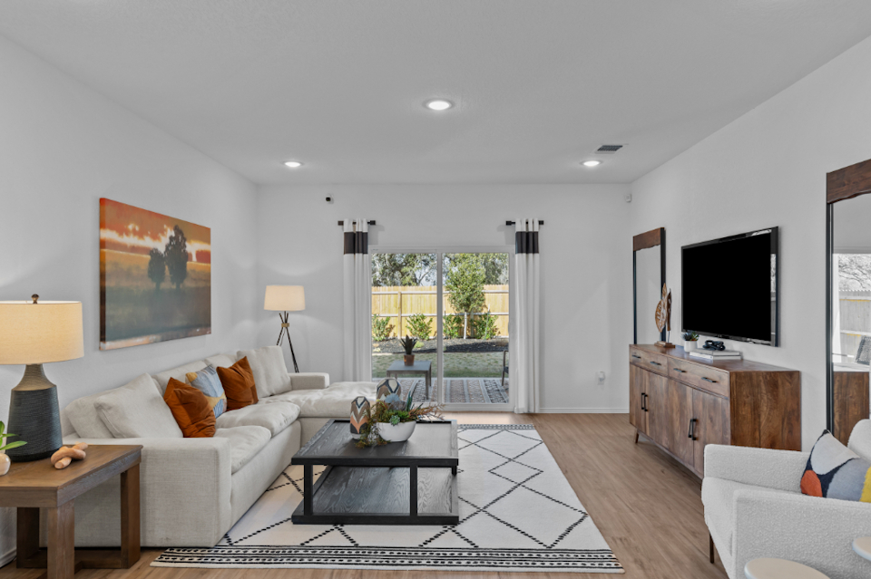 A living room with a large window.