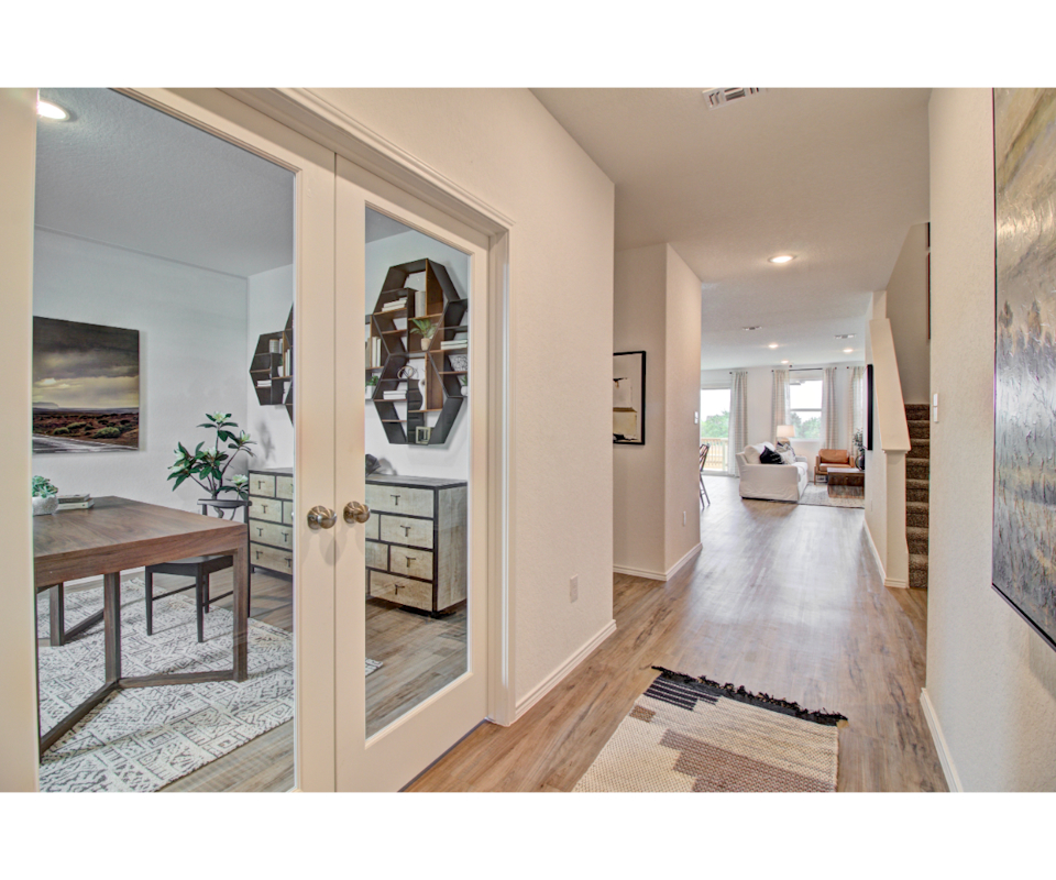 A room with a glass door.