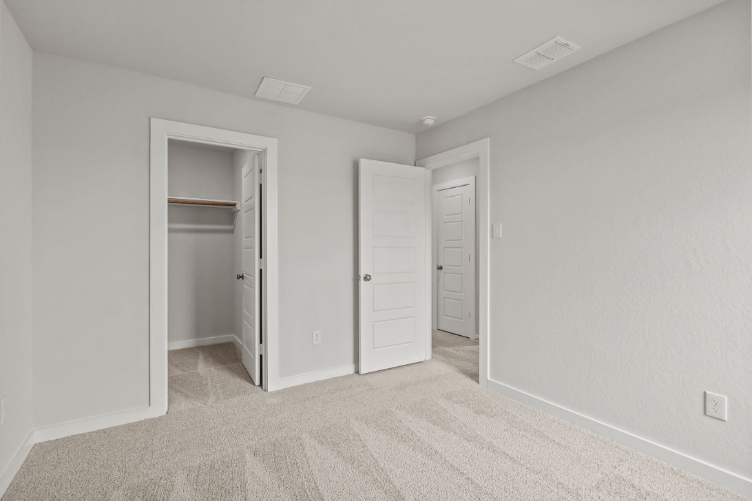 A room with white doors.