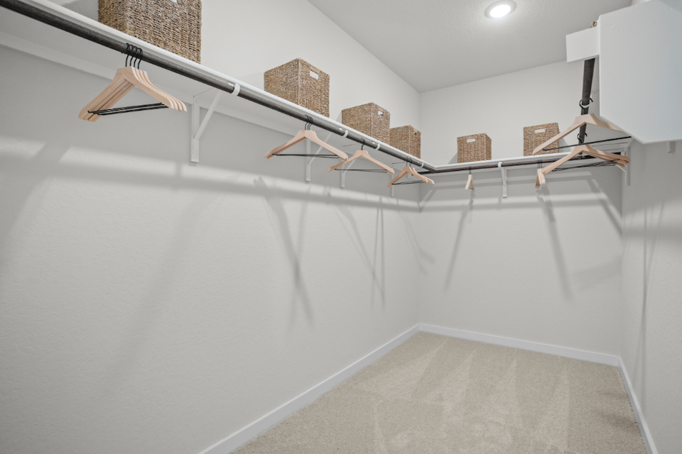 A white wall with a white wall and a white wall with a light.