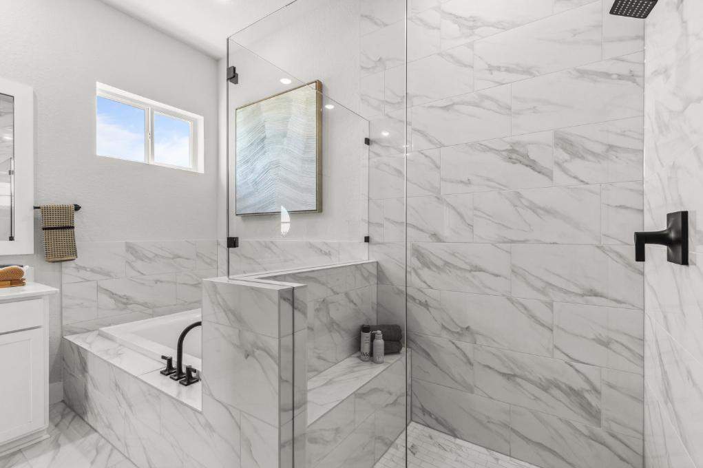 A bathroom with a glass shower.
