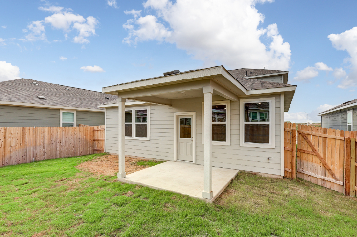 A house with a fence around it.