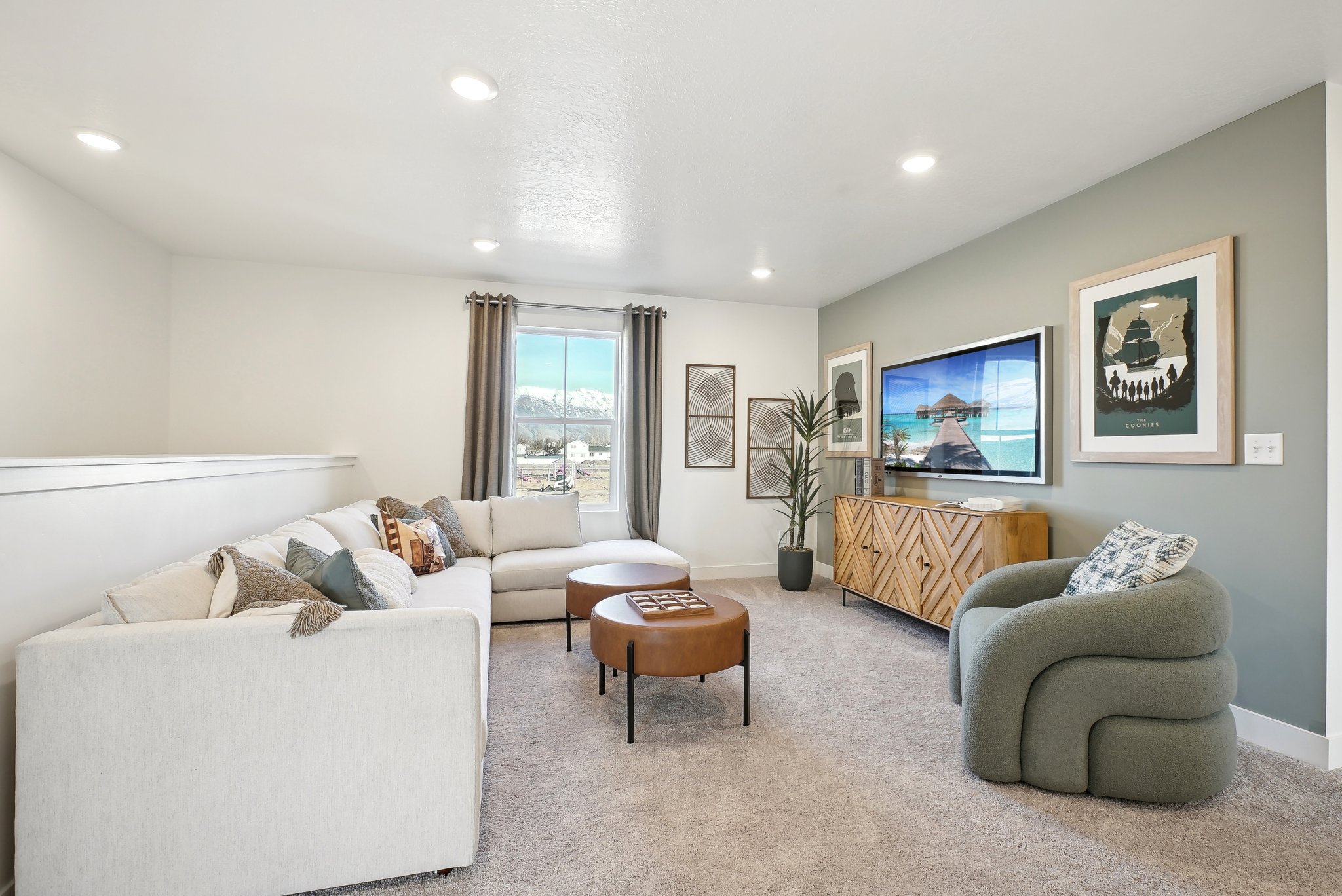 A living room with a tv and couches.