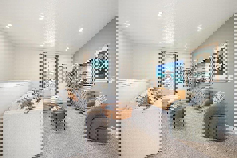 A living room with a tv and couches.