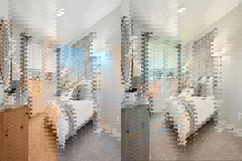 A bedroom with a large bed.