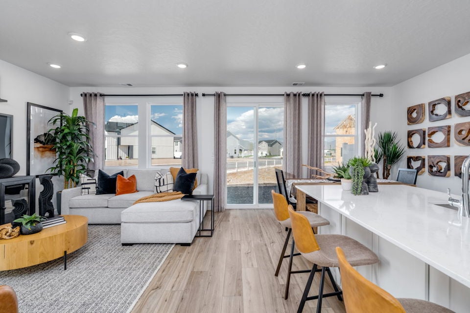 A living room with a large window.