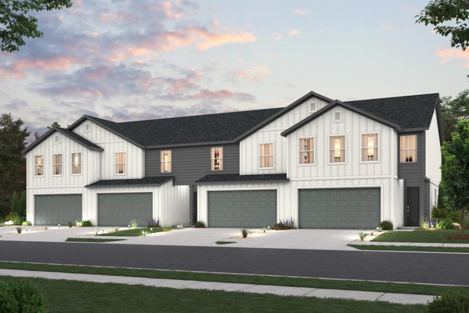 A large house with garages.