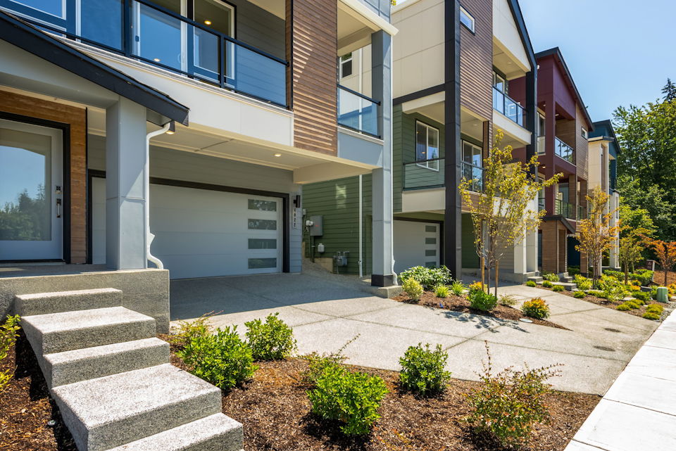 A building with a driveway and a brick driveway.