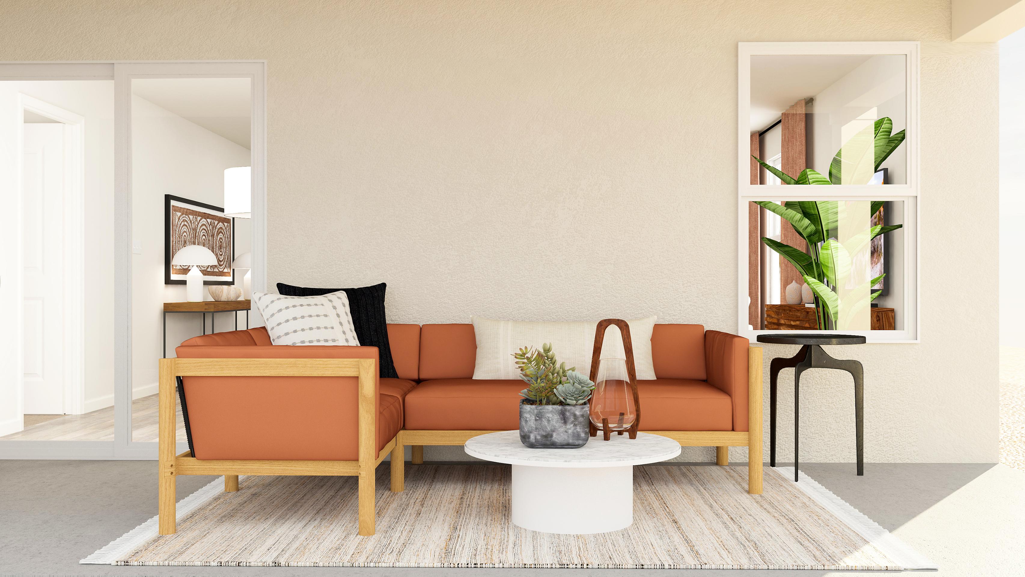 A living room with a couch and a coffee table.