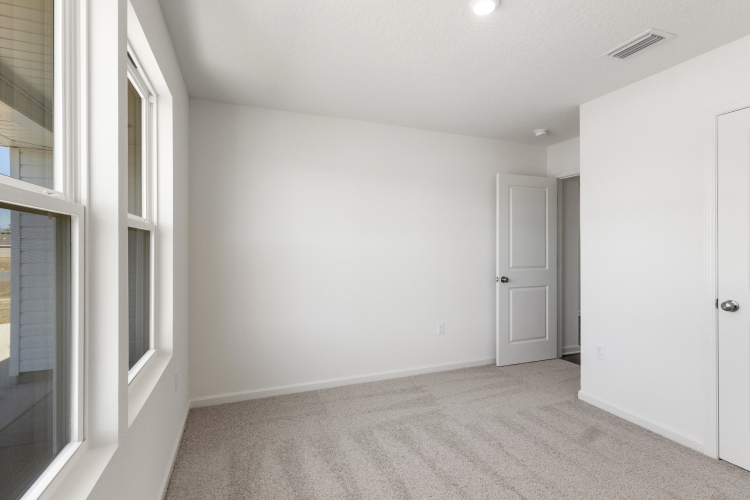 A room with white doors.