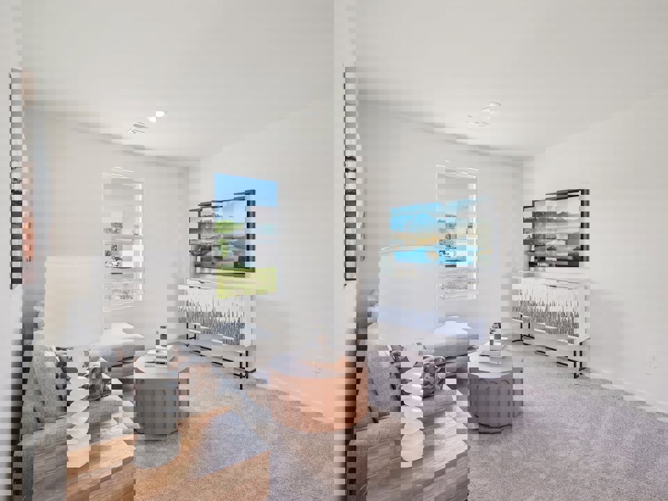 A living room with a tv and a couch.