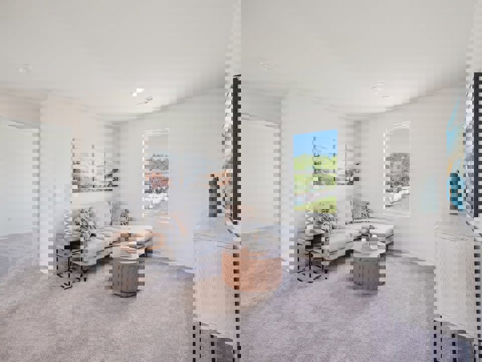 A living room with a couch and a coffee table.